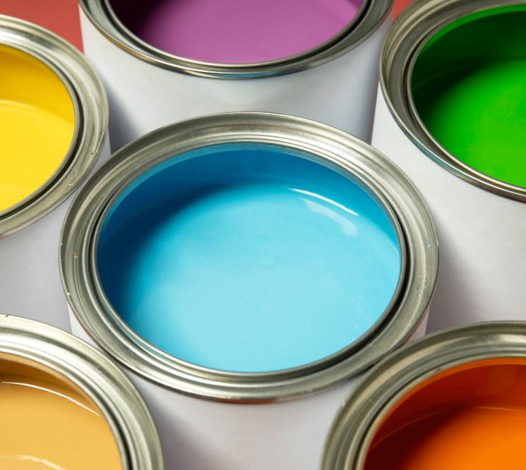 high-angle-colorful-paint-cans